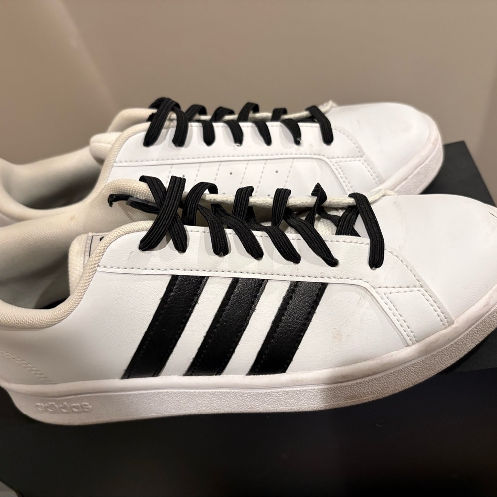 Adidas Grand Court sneakers. classic 3-Black stripes outside and 3white inside.